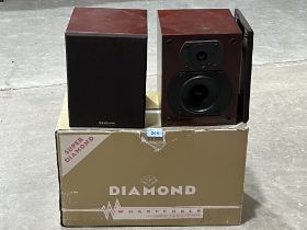 A pair of Wharfedale Super Diamond 2 way bookshelf loudspeakers. Original box and packing.