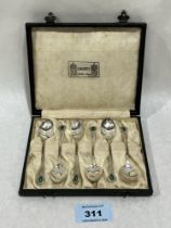 A cased George V set of six silver and enamel coffee spoons by Liberty & Co. Birmingham 1932. 1oz.