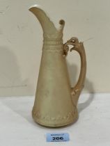 A Royal Worcester tusk jug, shape 1260, c. 1899. 8¼" high.