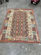 A Chobi Kilim rug. 1.46m x 1.92m.