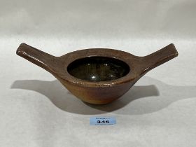 John Leach. British Contemporary. A two handled pottery vessel. Dated 1993. 9½" wide over handles.