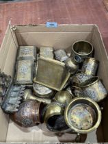 A box of Islamic metalware.
