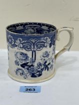 A Victorian pearlware blue and white transfer decorated mug. 4" high.