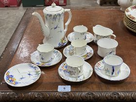 A Carlton Ware Springtime pattern coffee set for four with Carlton Ware cup and saucer in another