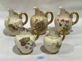 Five Royal Worcester tusk jugs. Shape 1094. 6" high and smaller.
