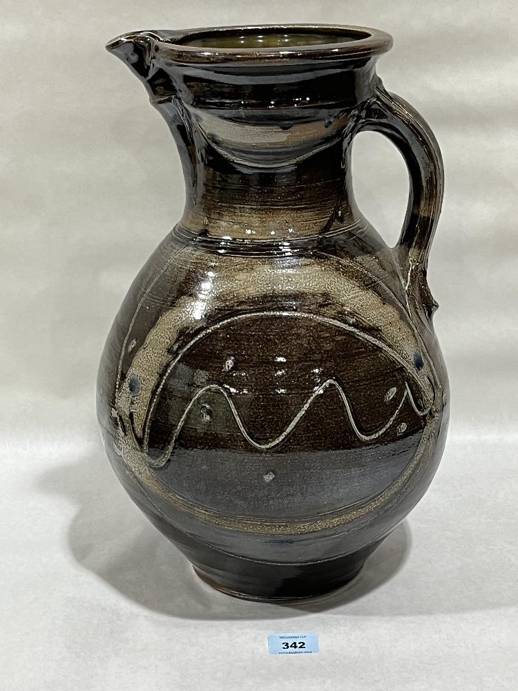 Rd Monogram On Studio Pottery A glazed studio pottery jug. Impressed monogram signature to handle ...