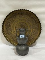 An Art-Nouveau period pewter planished vase, 9" high and an Islamic brass tray, 15" diam.