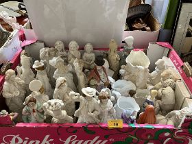 A box of ceramic figures.