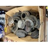A box of wagon hubcaps.