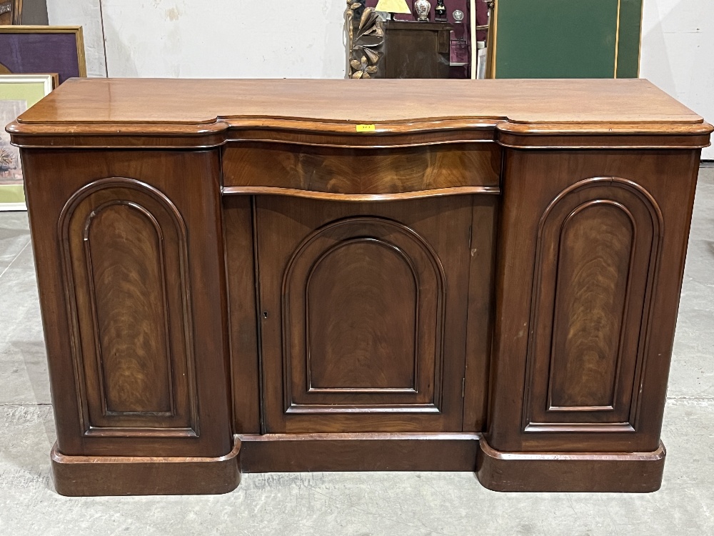 A Victorian mahogany inverted break-fronted sideboard. 60" wide