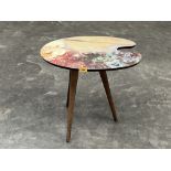 A 1950s style occasional table in the form of an artist's palette.