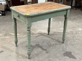 A Victorian painted pine table with frieze drawer on turned legs. 36" long.