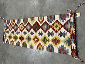 A Chobi Kilim runner. 1.5m x 0.62m.