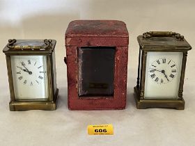 Two French brass carriage timepieces, one with travelling case.