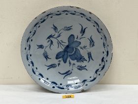 An 18th Century oriental blue and white deep dish. 11¼" diam