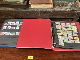 Three albums of stamps and mounted stamps