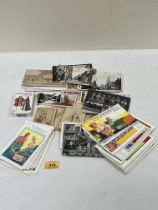 A collection of early 20th Century postcards.