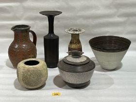 Six items of studio pottery.