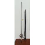 A North European swept hilt rapier sword with bone grip and leather scabbard. 46" long overall.