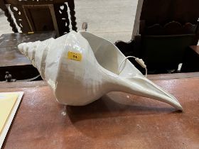 A shell form table lamp. 24" long.