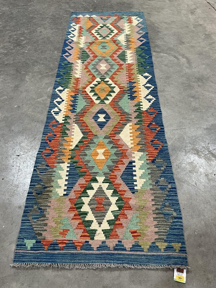 A Chobi Kilim carpet runner. 2.98m x 0.87m.