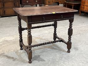 A William III and later joined oak side table with frieze drawer, on bobbin turned and square