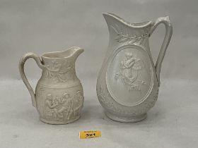 Two Victorian relief decorated parian jugs, the larger 8" high.