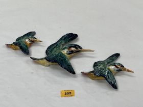 A set of three Beswick graduated kingfisher wall plaques, shape 729.