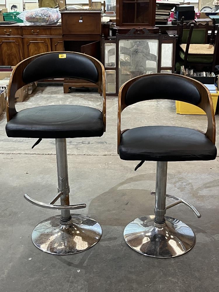 Two bentwood and chrome bar stools.