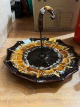 An unusual umbrella form ceramic cake stand.