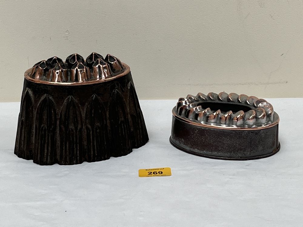 Two Victorian copper and tin jelly moulds, 4¾" high and smaller.