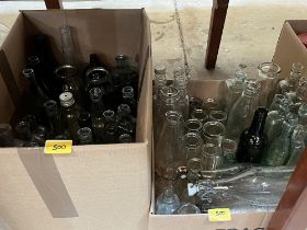 A quantity of glass bottles and jars.