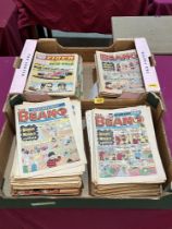 Two boxes of Beano and Tiger comics.