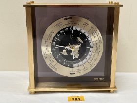 A Seiko World Time mantle clock 8¼" high