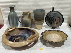 Six items of studio pottery.