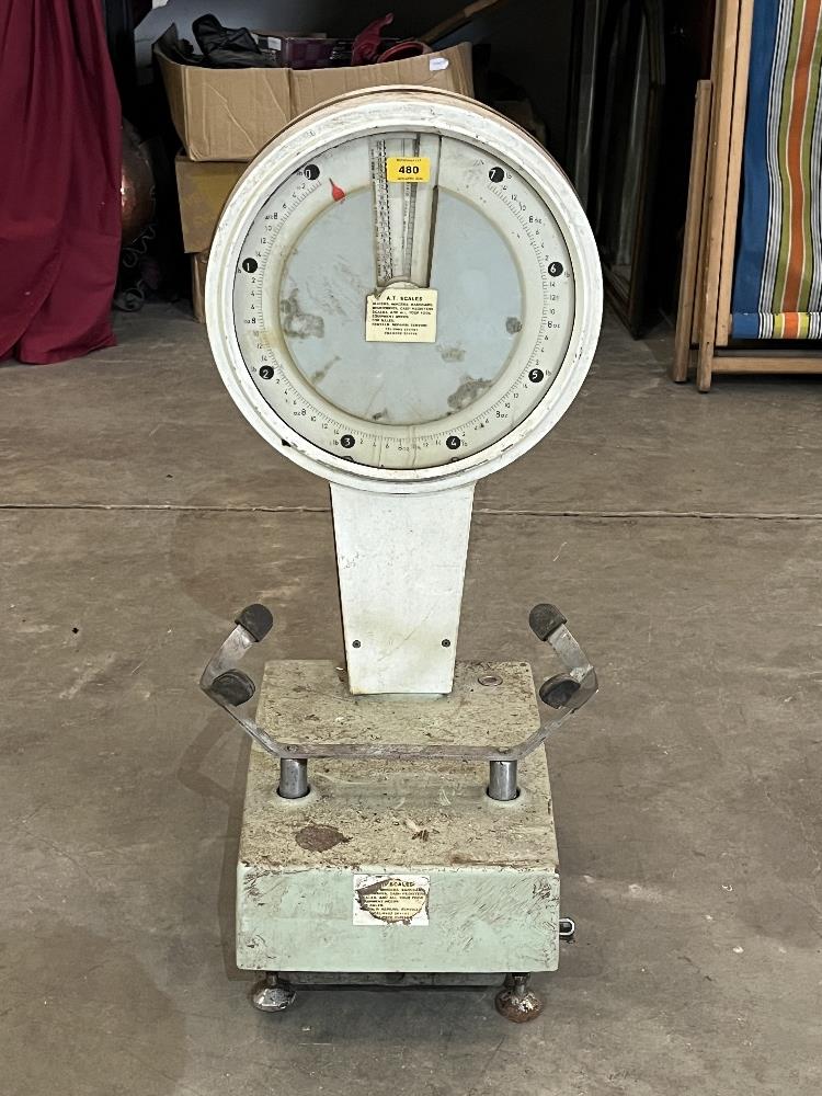 A set of shop weighing scales. 31" high.