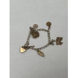 A 9ct charm bracelet, 5g.