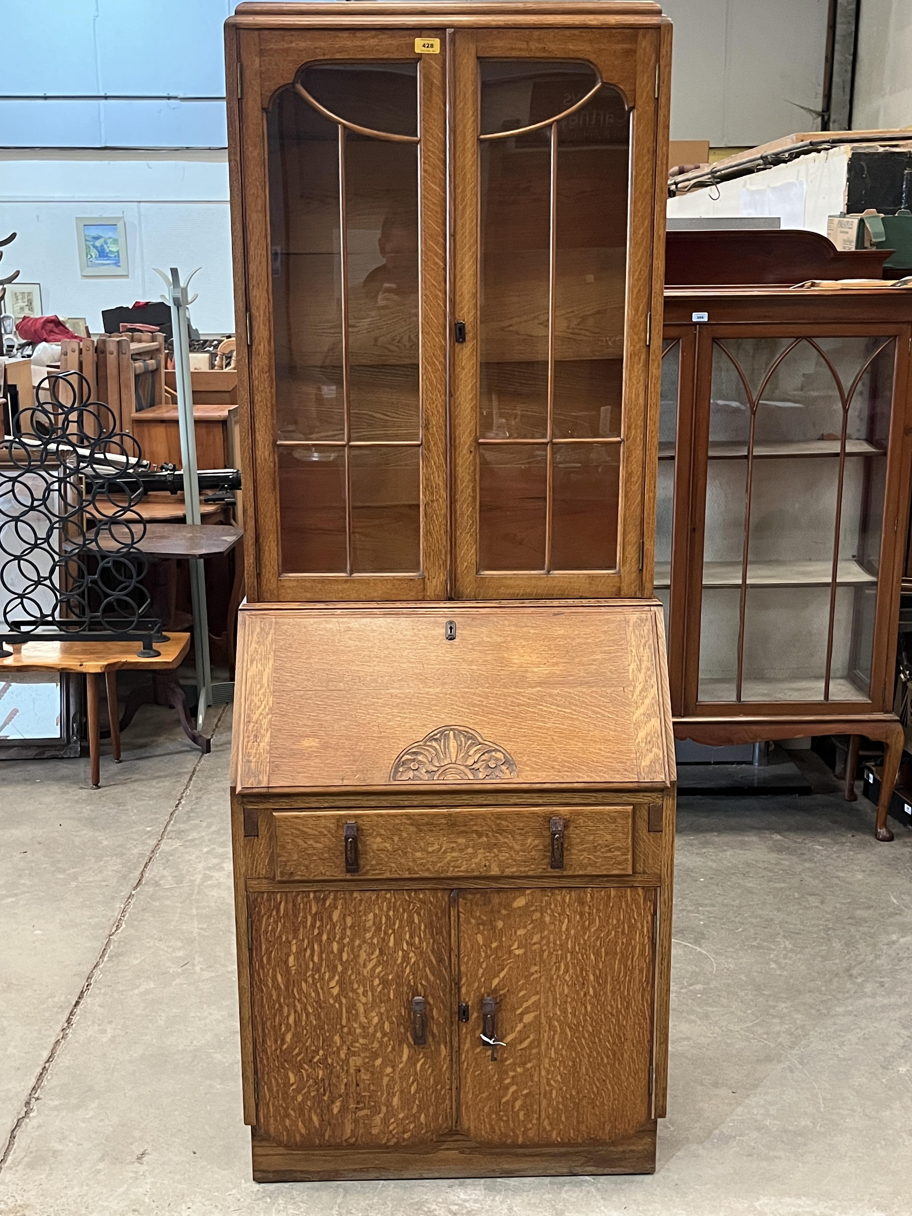 An oak bureau bookcase. 29" wide.