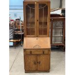 An oak bureau bookcase. 29" wide.