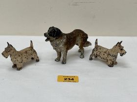 A cold painted speltar St Bernard 5" long with a pair of terriers.