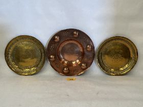 An Arts and Crafts Dryad Lester copper dish, 9" diam and a pair of brass dishes with engraved