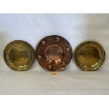 An Arts and Crafts Dryad Lester copper dish, 9" diam and a pair of brass dishes with engraved