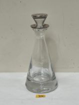 A conical decanter with silver mounted rim and stopper. Birmingham 2007. 12¼" high.