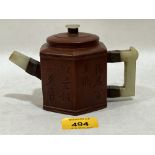 A Chinese Yixing Zisha clay teapot with hardstone handle and spout. 3¾" high.