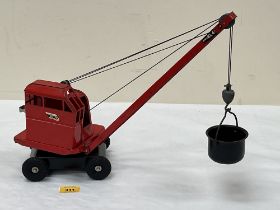 A Tri-ang Jones KL44 crane with hook and bucket.