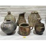 Six items of studio pottery.