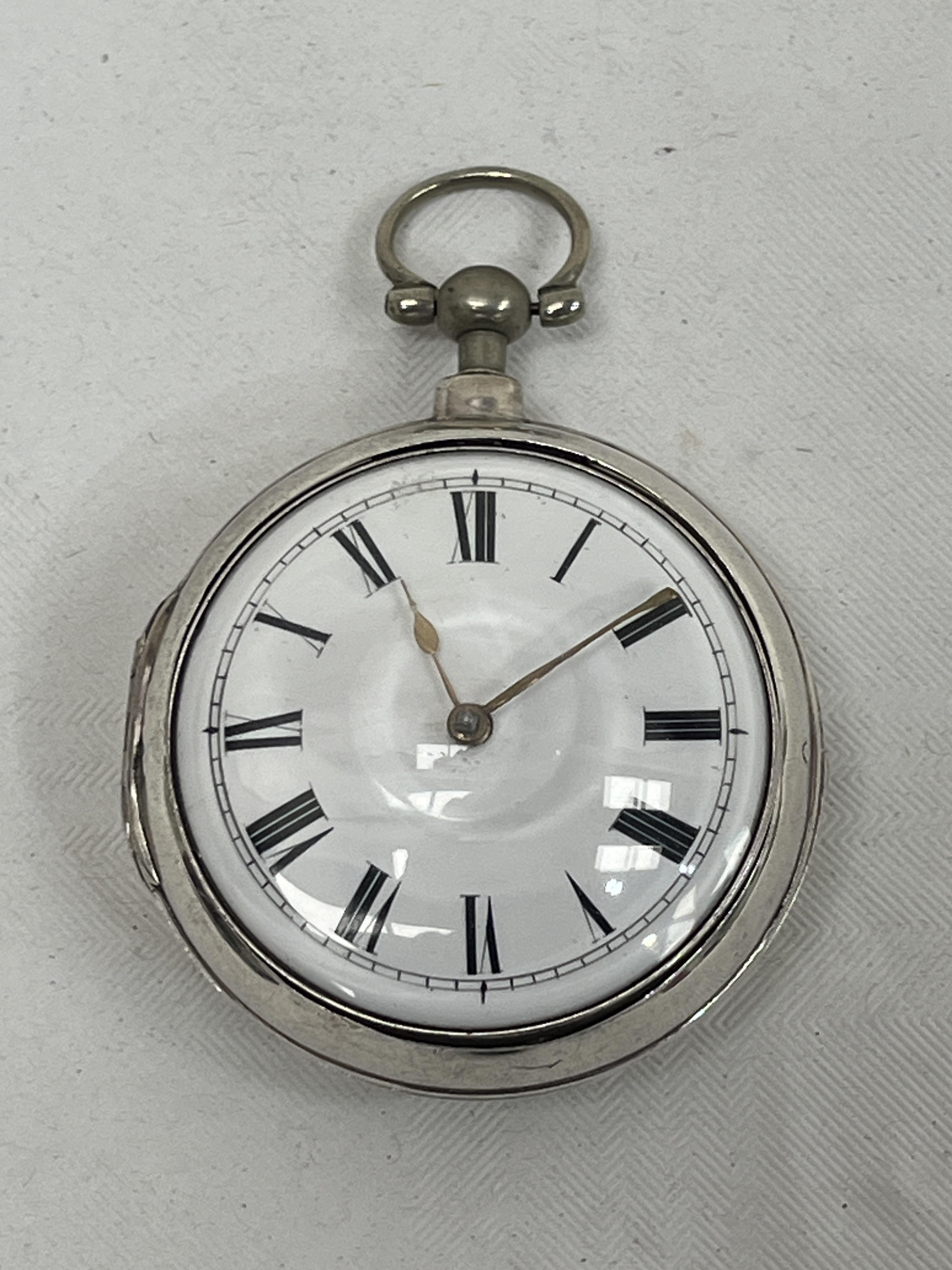 A George III silver pair cased verge watch, the gilded movement signed Wm Morgan, London and