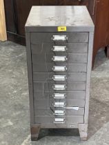 A ten drawer metal filing cabinet.