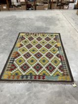 A Maimana Kilim rug. 1.87m x 1.47m.