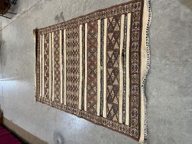 An Algerian flat weave carpet 8'2" x 4'9".